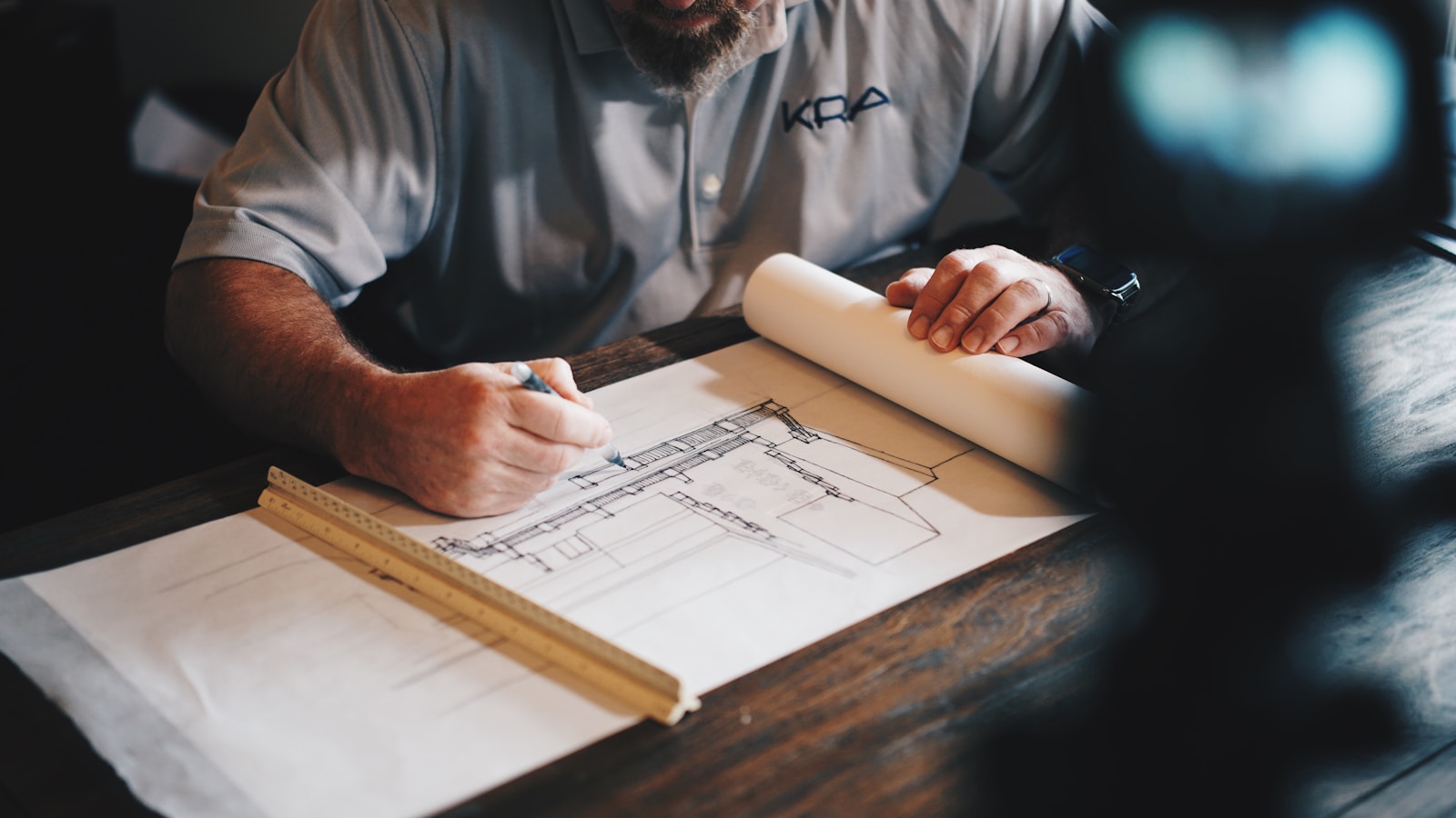 Architect reviewing plans for a new residential development in the Dominican Republic